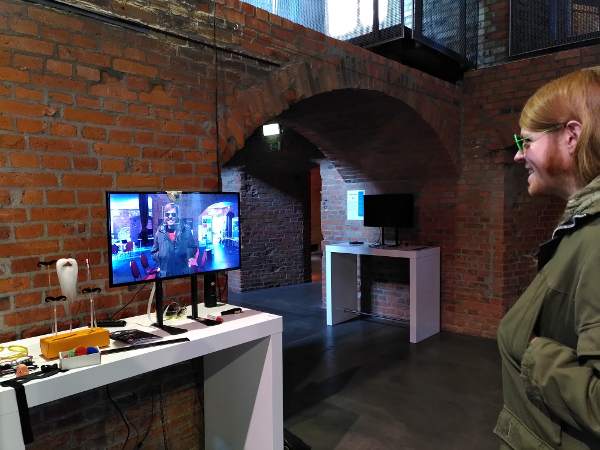 Visitor playing the face recognition game